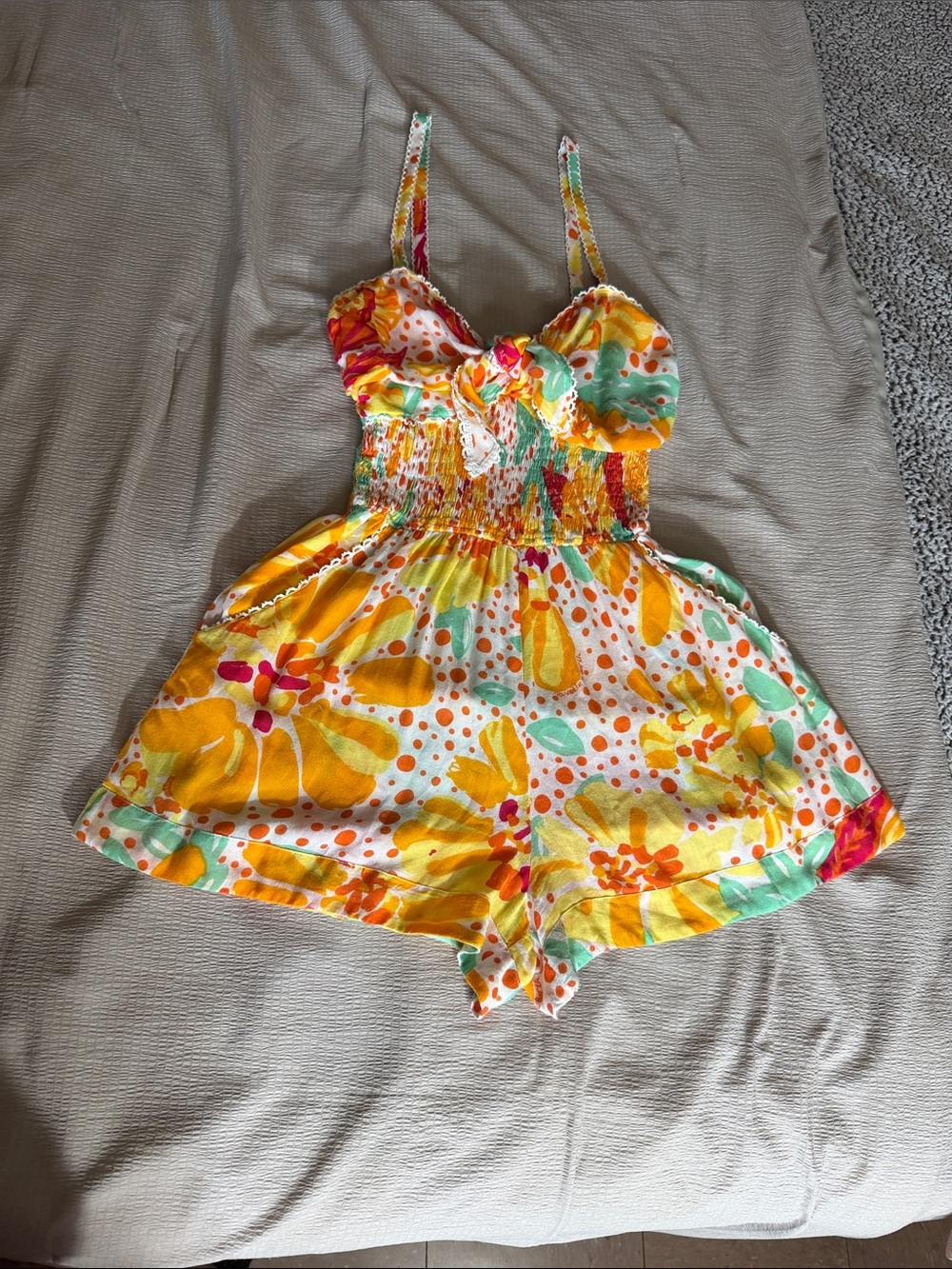 Poupette St. Barth Yellow Floral womenβs One-Piece Romper with colorful Accents